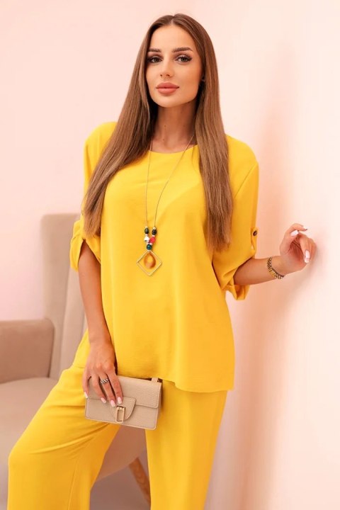 Komplet damska z bluzką z naszyjnikiem i szerokimi spodniami żółty