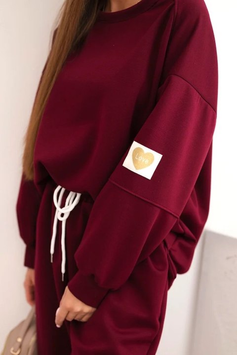 Komplet damski masełkowy z luźną bluzą i spodniami z napisem LOVE śliwkowy