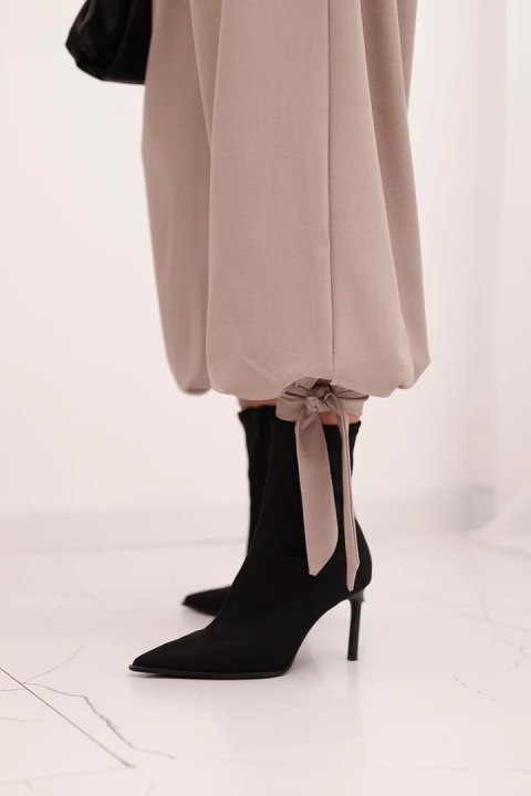 Spodnie damskie z szeroką nogawką i wiązaniem u dołu fango