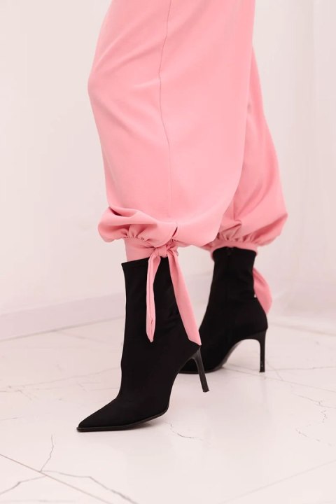 Spodnie damskie z szeroką nogawką i wiązaniem u dołu jasno różowe