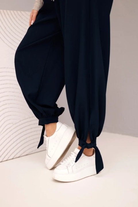 Spodnie damskie z szeroką nogawką i wiązaniem u dołu granatowe