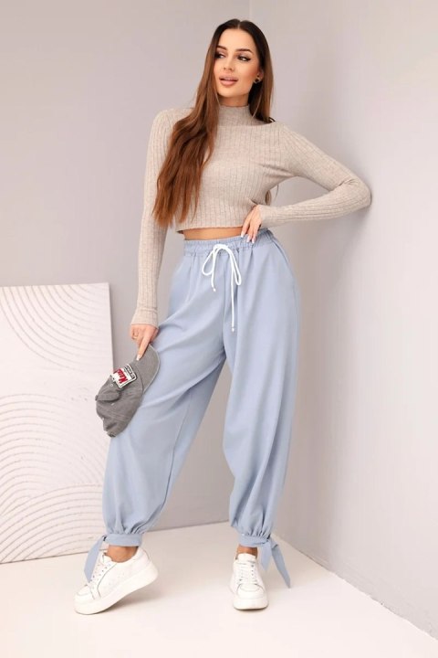 Spodnie damskie z szeroką nogawką i wiązaniem u dołu jeansowe