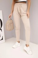 Spodnie damskie dresowe z elastycznym pasem i troczkiem beżowe